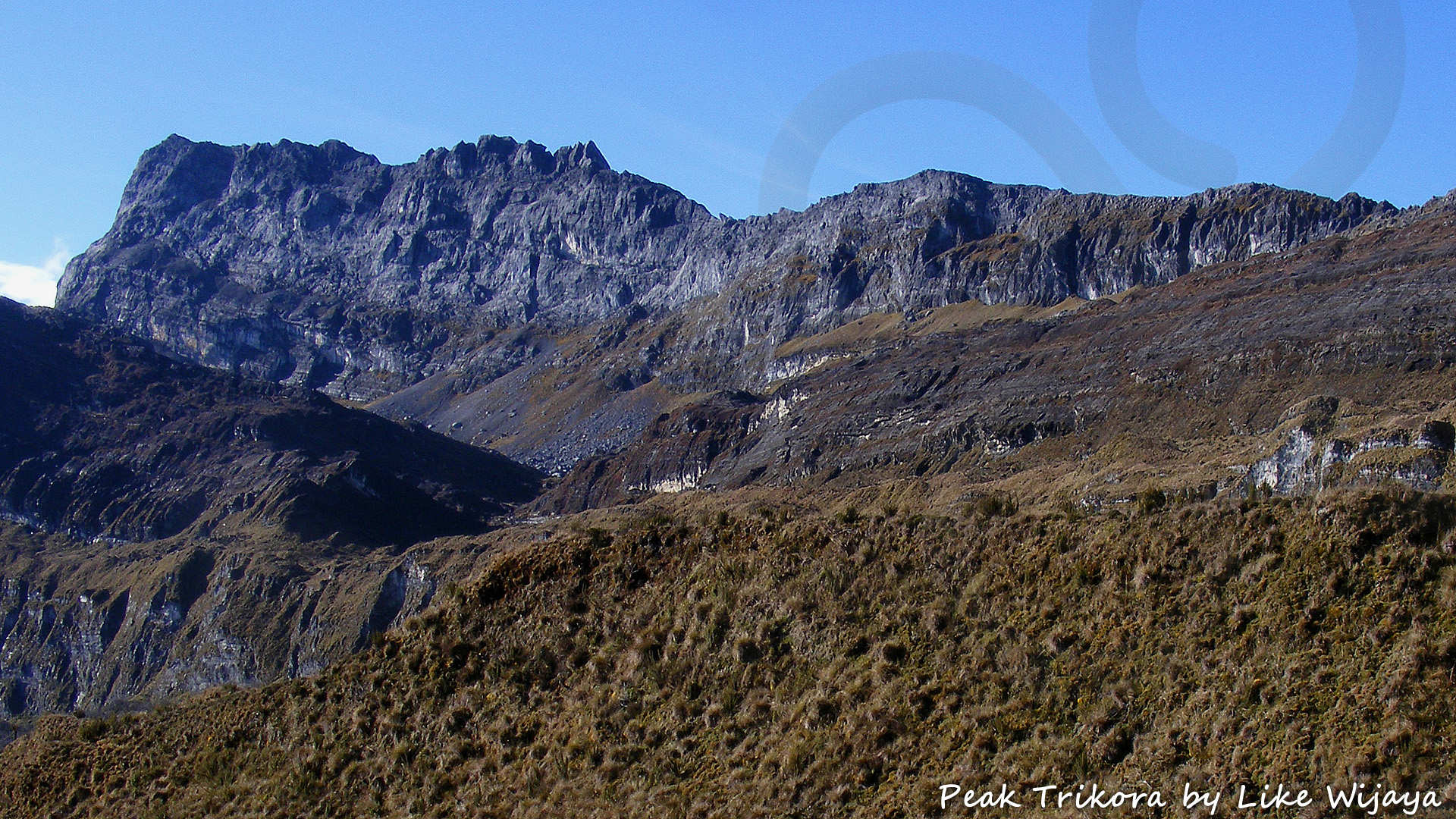 A view on Peak Trikora, formerly known as Wilhelmina, at 4,750 m New Guinea's third highest peak. Copyright &copy; Like Wijaya
